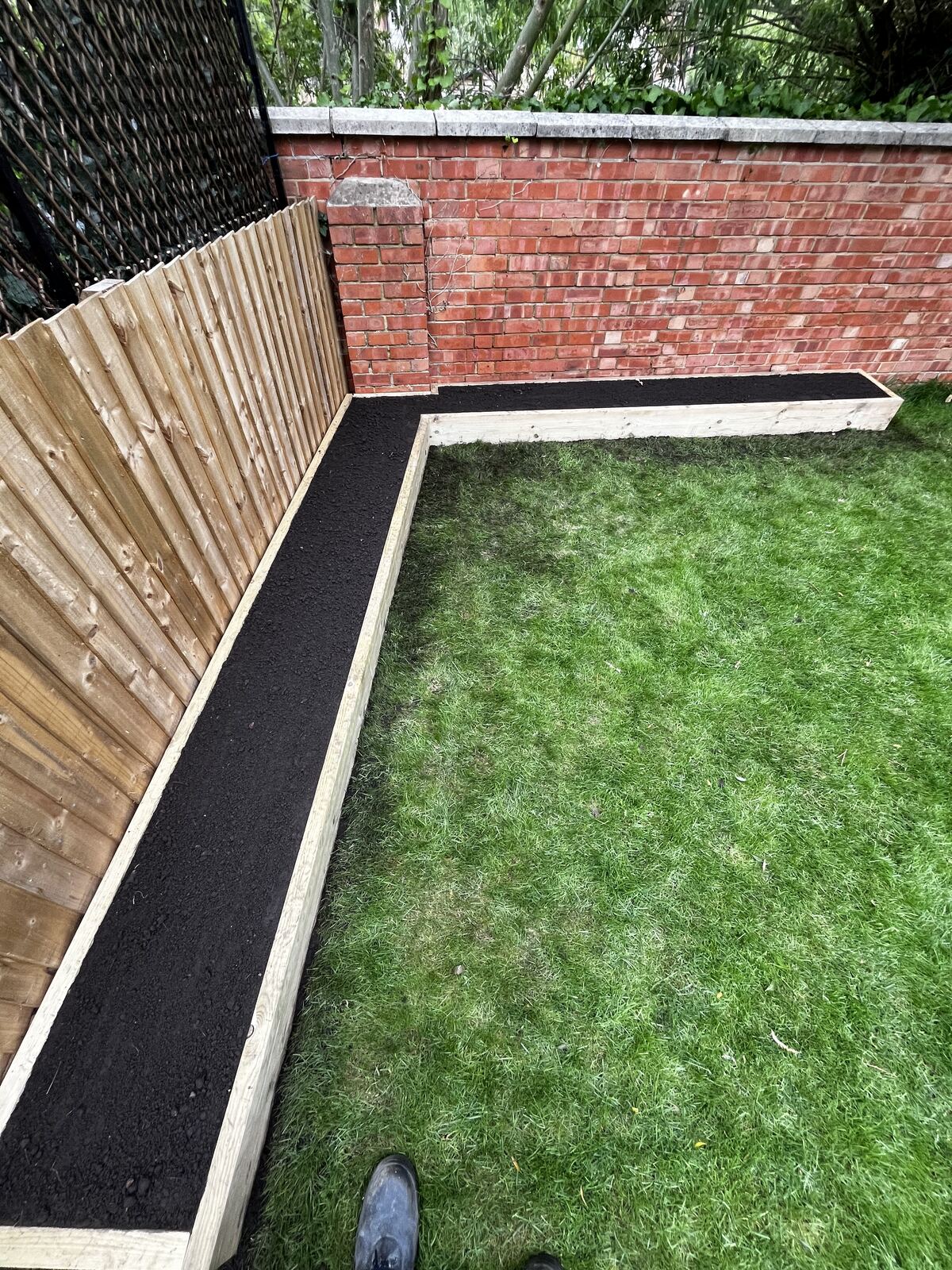 Raised sleeper garden beds