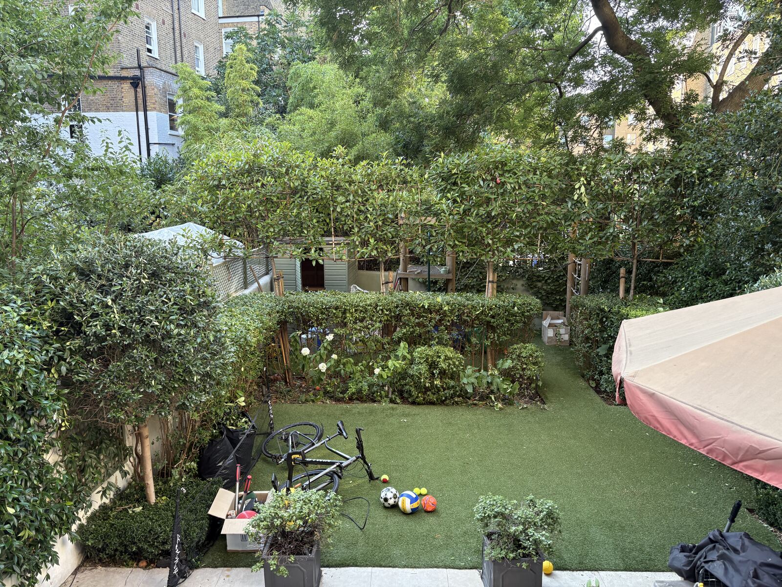 Maintained garden with hedging and artificial lawn, Earl's Court